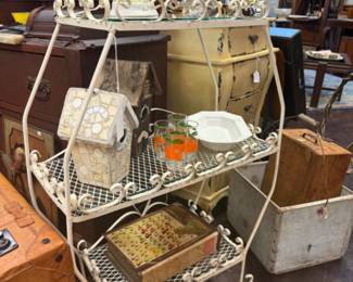 Vintage wrought iron bar or serving cart or plant stand, each shelf has glass