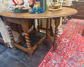 barley twist oak table, can also be used as an end table when folded down and then opened up could be used as kitchen table