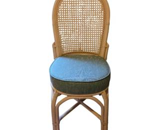 Rattan and Cane Dining Chair with a Green Cushioned Seat