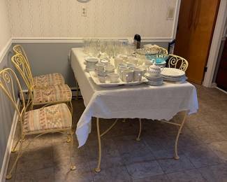 Will try to get a better photo, Metal table with glass top, five chairs
