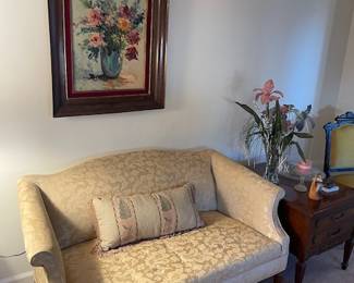 Upholstered love seat. Floral framed painting