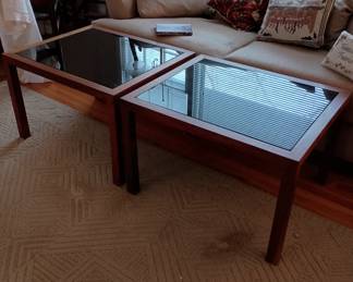 Two glass top  tables