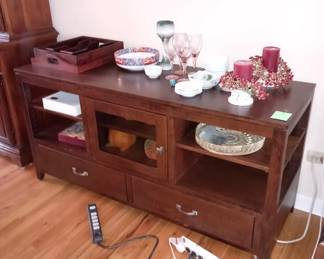 Television table/stand with storage capacity 