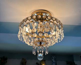 lots of vintage crystal and brass chandeliers and light fixtures for sale