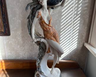 Porcelain sculptures of 1920s ladies by Guisepe Armani