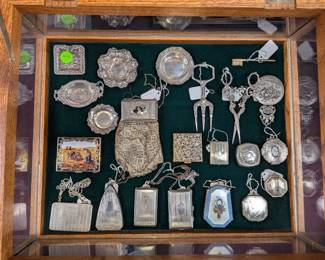 Silver or Silver plated compacts, purses, trays, mirrors and more.