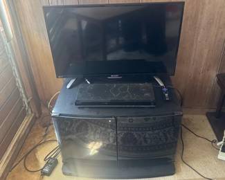 EFF166 - ROKUTV bundle w/ DVD Player & TV Stand 