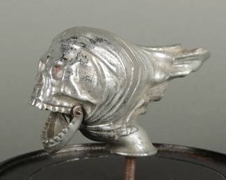 Skull Automotive Mascot. Circa 1930's. 6" long and 3 1/4" tall