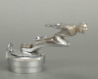 Art Deco 1920's Automotive Mascot. Has a flying man. Measures 5" tall and 8" long