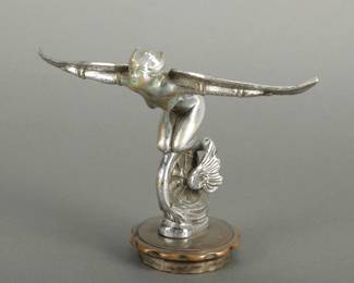 Wheel on Wings Automotive Mascot. Female figure measuring 6 1/2" tall and 8 1/2" wide