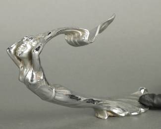 1929-1931 Cadillac Lady Scarf Hood Ornament. Measures 4 3/4" tall and 9" long