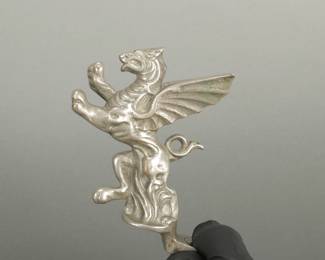 Griffen Hood Ornament.  4 3/8" tall and 3" wide