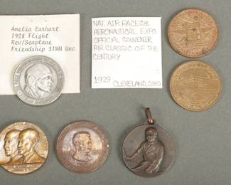 6 Flight Related Tokens/Medallions. 2 are of the 1929 Cleveland Air Races. Worn, 1927 Lindbergh medallion. 1933 Chicago World's Fair with pilot. Wright Brothers 50th Anniversary 1953 Medallion. 1928 Amelia Earhart Medallion. 1st Woman across the Atlantic.