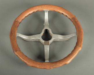 1912 Buick Steering Wheel. This is wooden with a tilt lock tag. Measures 17" diameter