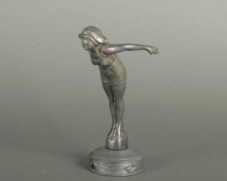 Krone & Sebek Casting Diving Girl Automotive Mascot. 7 5/8" tall and arm width is 4 1/8"