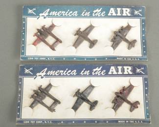 2 Cards of 1940's Lico Toys. 6 plastic US military planes on cards. Red discoloration on 2 planes.