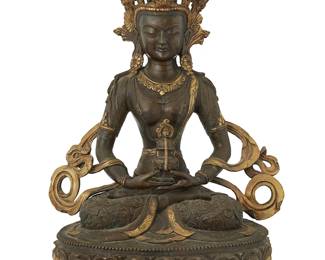 1067
A Tibeto-Chinese parcel gilt bronze figure of Amitayu
18th/19th century or later
With impressed seal to baseplate
16.25" H x 11.5" W x 7.75" D
Estimate: $2,000 - $3,000