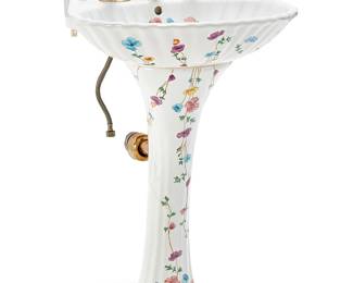 1322
A Les Bains Decorés shell-form porcelain pedestal sink
Late 20th century
Marked verso: Les Bains Decorés De Porcelaine / [crossed arrows] / De Paris France
With gold-toned metal faucet and fixtures, decorated in floral motifs, the basin in the form of a scallop shell
37.25" H x 24" W x 18.5" D
Estimate: $200 - $300