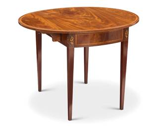 1179
A George III style inlaid mahogany Pembroke table
20th century
With inlayed floral accents and single drawer to one side
Stored: 24.25" H x 27.25" W x 18.25" D; Open: 33" D
Estimate: $400 - $600