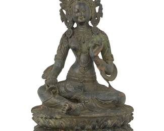 1073
A Tibeto-Chinese bronze figure of a female deity
18th century or later
With impressed seal to baseplate
Likely depicting Tara
11" H x 6.5" W x 4.5" D
Estimate: $800 - $1,200