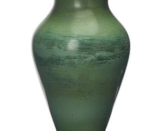 1260
A Louis Comfort Tiffany art pottery vase
Circa 1904-1914
Designed by Louis Comfort Tiffany (1848-1933)
Incised to underside: LCT [conjoined] / 7
With stepped foot and rim
21.25" H x 11.5" Dia.
Estimate: $1,500 - $2,000