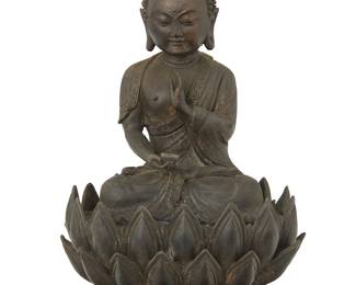 1302
An Asian bronze Buddha figure
20th century
With impressed seal to baseplate
8.5" H x 5.5" W x 4.5" D
Estimate: $300 - $500