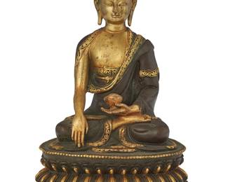 1069
A Tibeto-Chinese parcel gilt bronze figure of Shakyamuni Buddha
18th century or later
With impressed seal to baseplate
Teacher Buddha
8.25" H x 5.25" W x 4.25" D
Estimate: $800 - $1,000