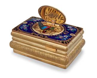 1228
A French automaton singing bird box
Griesbaum model 216 or after, retailed by Tiffany & Co., late 20th century
Marked to underside: Tiffany & Co.
Housed in a chased gilt-metal case with cobalt blue guilloché enamel and hand-painted and gilt lid, opening when wound to reveal a rotating animated bird of assembled feathers and armature, with articulating wings and beak
1.875" H x 4.25" W x 2.875" D
Estimate: $3,500 - $4,500