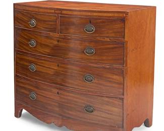 1181
A George III style inlaid mahogany bowfront chest
Early 20th century
With five locking drawers and shaped apron
38.5" H x 41.5" W x 20.75" D
Estimate: $400 - $600