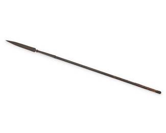 1127
A large Indo-Persian spearhead
18th century
Mounted on a later leather-clad wooden shaft
Overall: 80.5" L, metal: 28" L, blade: 16.5" L
Estimate: $400 - $600
