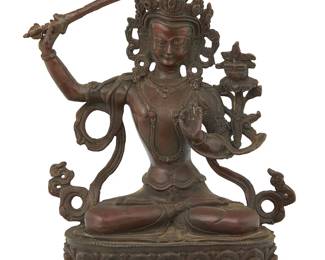 1071
A Tibeto-Chinese bronze figure of Manjushri
19th century
With impressed seal to baseplate
8" H x 5" W x 3.5" D
Estimate: $700 - $900