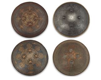 1119
Four Persian parcel-gilt iron shields
18th/19th century
4 pieces
Each: 17" Dia. approximately
Estimate: $1,500 - $2,000