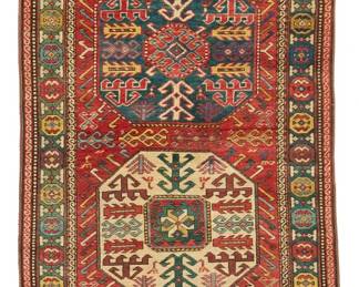 1110
A Kazak runner
Early 20th century
Wool on wool foundation
12' 1" L x 3' 7" W
Estimate: $1,000 - $1,500
