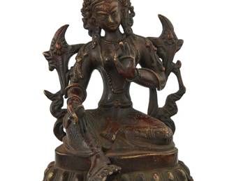 1076
A Tibeto-Chinese parcel gilt bronze figure of Tara
18th century or later
With impressed seal to baseplate
4.5" H x 3.5" W x 3.5" D
Estimate: $500 - $700