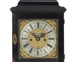 1165
A Claude Viet George I ebony veneered table clock
Early 18th century
Marked to dial: Viet London; marked to movement: Claude Viet / London
The 7" square brass dial with silvered chapter ring having Roman hours and Arabic minutes, inscribed Viet London to the mock pendulum aperture, with date aperture above VI to the matte center and strike/silent adjuster at III, within cast cherub spandrels; the five ring pillar movement with twin train fusee movement and now with anchor escapement and locking pendulum with bolt, the well engraved backplate inscribed 'Claude Viet London,' contained within an ebonized wood case with gilt-metal carrying handle
14.25" H x 10.375" W x 6.625" D
Estimate: $3,000 - $5,000
