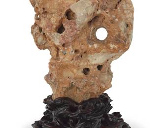 1093
A Chinese Taihu scholar stone
20th century
Raised on a custom root wood stand
Stone: 17.5" H x 14.5" W x 10" D; Overall: 22" H x 14.5" W x 11" D
Estimate: $1,000 - $1,500