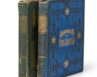 1189
Mark Twain (1835-1910)
1876-1885
Hardcover books
Two works:

Clemens, Samuel. "The Adventures of Tom Sawyer." Hartford, et al: The American Publishing Company, 1876
Second Printing
The octavo bound in cloth with debossed gilt and ink decorations
8.875" H x 7" W x 1.125" D

Clemens, Samuel. "Adventures of Huckleberry Finn (Tom Sawyer's Comrade)." New York: Charles L. Webster and Company, 1885
Second Printing
The octavo bound in cloth with debossed gilt and ink decorations
8.75" H x 7" W x 1.375" D

2 pieces
Estimate: $400 - $600