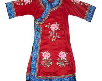 1048
A Chinese woman's red silk robe with floral embroidery
Qing Dynasty (1644–1912) or later
Label: Harry Fireside / 219 Sutter Street / San Francisco; with stamp and signature in ink to lining at collar
The long red silk robe featuring multiple embroidered pink peony flowers and with blue brocade trim to collar, front edges, hem and sleeves, additional brocade ribbon trim and with an asymmetric right side fastening and a cream man-made fabric lining
56" H at center back x 60" W across shoulders; waist at front: 22.5" W
Estimate: $600 - $800