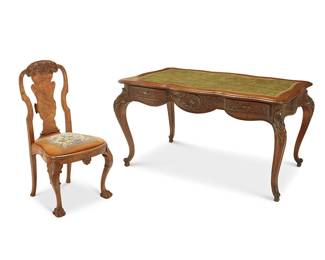 1312
A Rococo style bureau plat with side chair
20th century
The carved wood desk with green leather gilt-stamped top above two locking drawers to one side, featuring carved shells and floral and foliate motifs, raised on cabriole legs with scrolled feet; Chair: The carved wood chair with burlwood veneer, the crest rail with bellflower and foliate motifs and the front adorned with shell accents, raised on ball-in-claw feet, featuring a needlepoint upholstered seat cushion depicting a floral basket arrangement
Desk: 30.75" H x 59" W x 34.25" D; Chair: 41.75" H x 23" W x 23" D
Estimate: $150 - $250