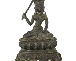 1287
An Asian bronze figure of Manjusri
20th century
Raised on a base with elephant-form feet
12.375" H x 7" W x 5.5" D
Estimate: $300 - $500