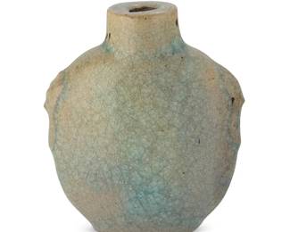 1042
A Chinese crackle glazed porcelain snuff bottle
19th/20th century
With Guyuexuan inscription to underside
With opposed figural ring handles in low relief
2.625" H x 2.375" W x 1.125" D
Estimate: $150 - $250