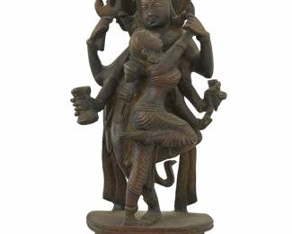 1100
An Indian bronze figural group of Shiva and Parvati as Mithuna
19th century or later
10.125" H x 4.875" W x 2.75" D
Estimate: $350 - $550