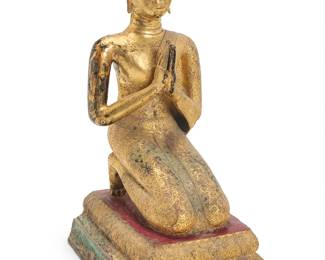 1083
A Southeast Asian gilt bronze kneeling Buddhist monk devotee
Rattanakosin Period (1782-1932) or later
Possibly Mogallana or Shariputra, with hands in anjali mudra and mother of pearl inlaid eyes and robe accents
38" H x 18" W x 23" D
Estimate: $1,000 - $1,500