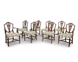 1176
A set of eight George III style mahogany dining chairs
Early 20th century
Each with shield-back and seat upholstered in a floral pattern fabric with passementerie trim, comprising two armchairs and six side chairs
8 pieces
Each armchair: 38.25" H x 25" W x 22.5" D; Each side chair: 37.75" H x 22" W x 21" D
Estimate: $400 - $600