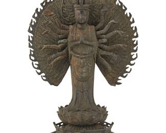1299
An Asian bronze figure of Avalokitesvara
20th century
With flaming prabhamandala
Overall: 14.25" H x 9.25" W x 7" D
Estimate: $400 - $600
