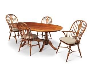 1340
An assembled dining table and four Windsor chairs
20th/21st century
The oak and elmwood set, comprising an oval table raised on double pedestal tripod supports joined by a shaped bar stretcher, and four Windsor chairs, each with fiddle splat and spindle back raised on turned legs joined by a crinoline stretcher, with later fabric upholstered seat cushions, including two side chairs and two armchairs, with intentional antiquing
5 pieces
Table: 29" H x 72.25" W x 42.25" D; Each armchair: 40.75" H x 21" W x 26.5" D; Each side chair: 38" H x 19.5" W x 22" D
Estimate: $300 - $500