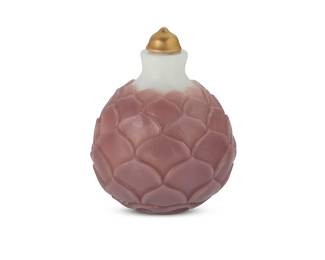 1044
A Chinese overlaid glass snuff bottle
Late Qing Dynasty (1644-1912) or later
In the form of a lotus flower, with gilt ceramic cap
2.5" H x 2" Dia.
Estimate: $600 - $800