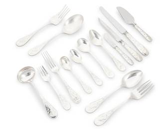 1018
A Tiffany & Co. sterling silver 'Audubon' flatware service
Mid/late 20th century
Designed 1956
Each marked for sterling and with factory marks
Comprising:
12 steak knives (8.875")
12 dinner knives (10.125")
12 butter spreaders (6")
12 dinner forks (8.25")
12 salad forks (6.75")
12 cream soup spoons (7.125")
12 oval soup spoons (7.375")
12 teaspoons (6.375")
2 tablespoons (8.625")
1 cold meat serving fork (8.75")
1 gravy ladle (7.5")
1 pastry server (7")
1 sugar spoon (6")
2-piece salad serving set (9.125")
104 pieces
Total weighable sterling: 154.5 oz. troy approximately
Estimate: $10,000 - $15,000