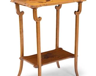1254
A Gallé marquetry fruitwood side table
Early 20th century; France
Signed in marquetry: Gallé
Depicting birds and autumnal leaves
29.25" H x 22.25" W x 15" D
Estimate: $1,200 - $1,800