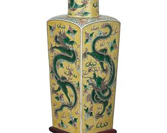 1149
A Chinese Famille Jaune porcelain dragon vase
Late Qing Dynasty/Republic Period (1644-1949)
Bearing an apocryphal reign mark for Kangxi Period (1662-1722)
Raised on a carved hardwood stand
Vase: 14" H x 4.625" W x 4.625" D; Stand: 2.25" H x 5" W x 5" D
Estimate: $1,000 - $1,500